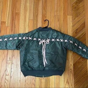 green bomber jacket w/ pink lace